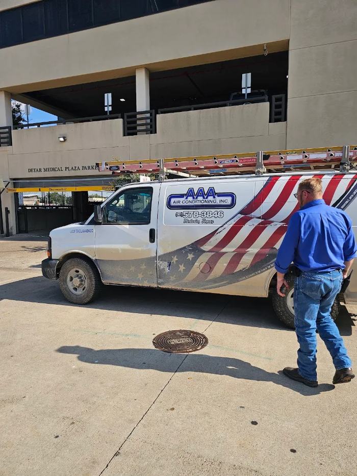 AAA Air Conditioning service van parked at a Victoria, Texas medical plaza for an HVAC service call